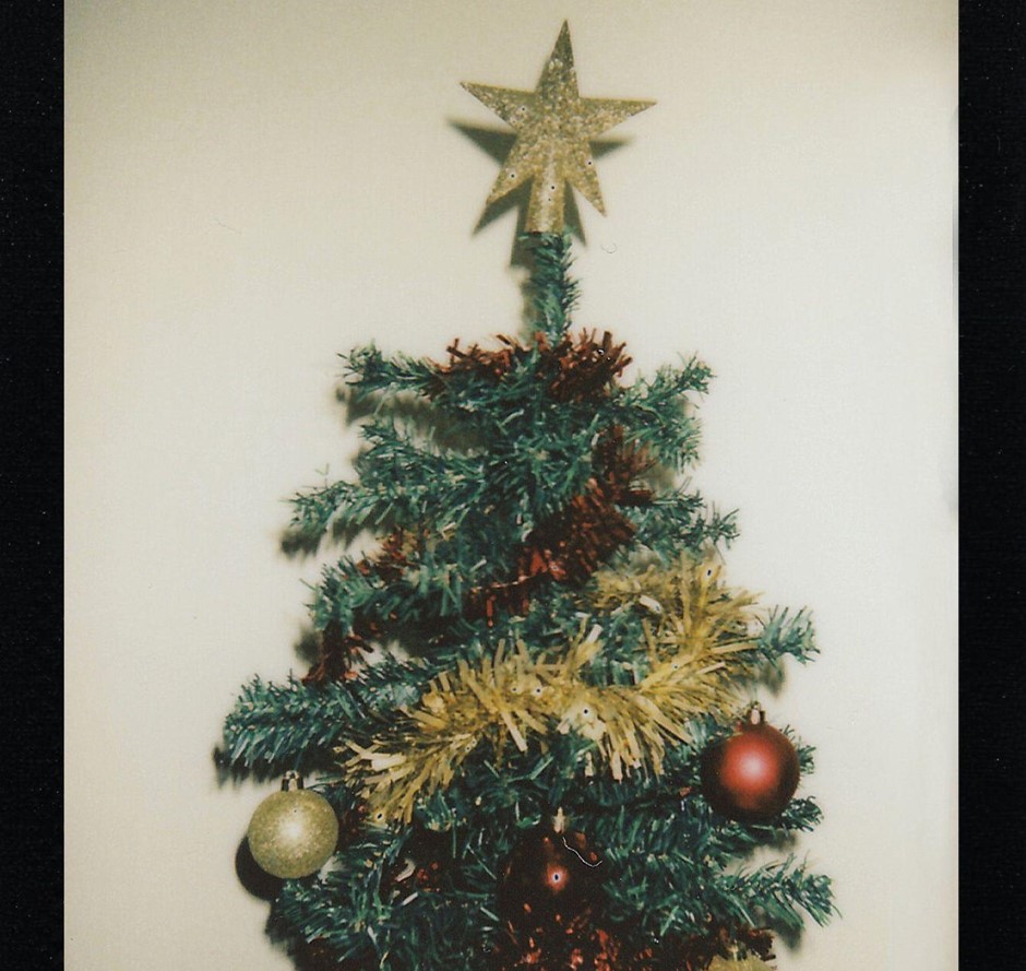 Prelit Artificial Christmas Trees: Brightening Homes & Hearts